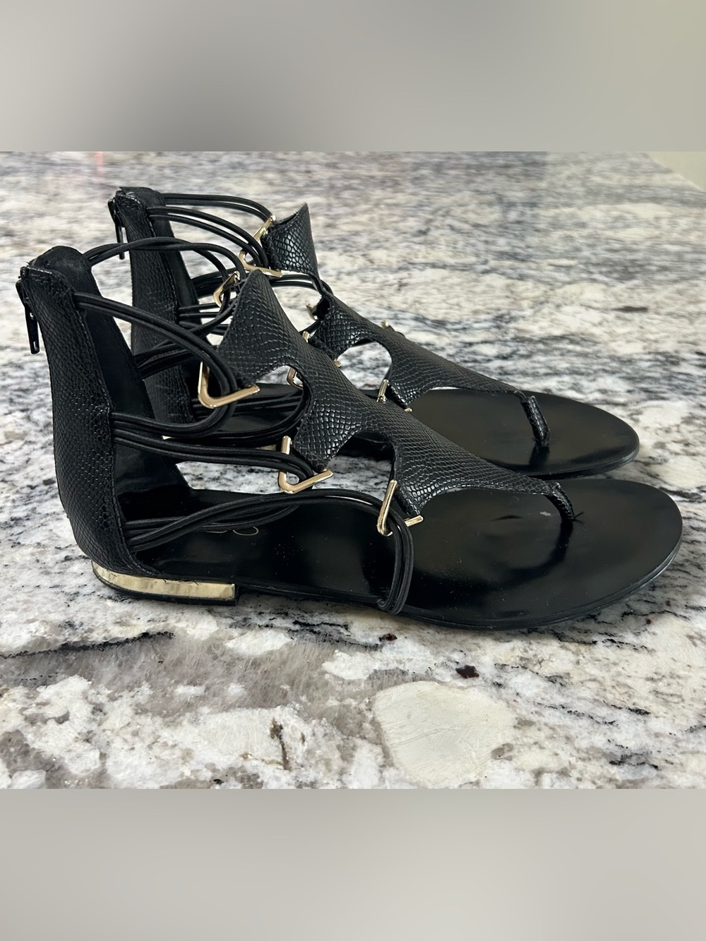 Aldo Black Gladiator Sandals with Gold Accents